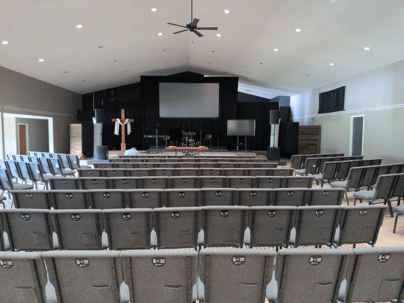 Before — CenterPoint Church stage under flat house lighting