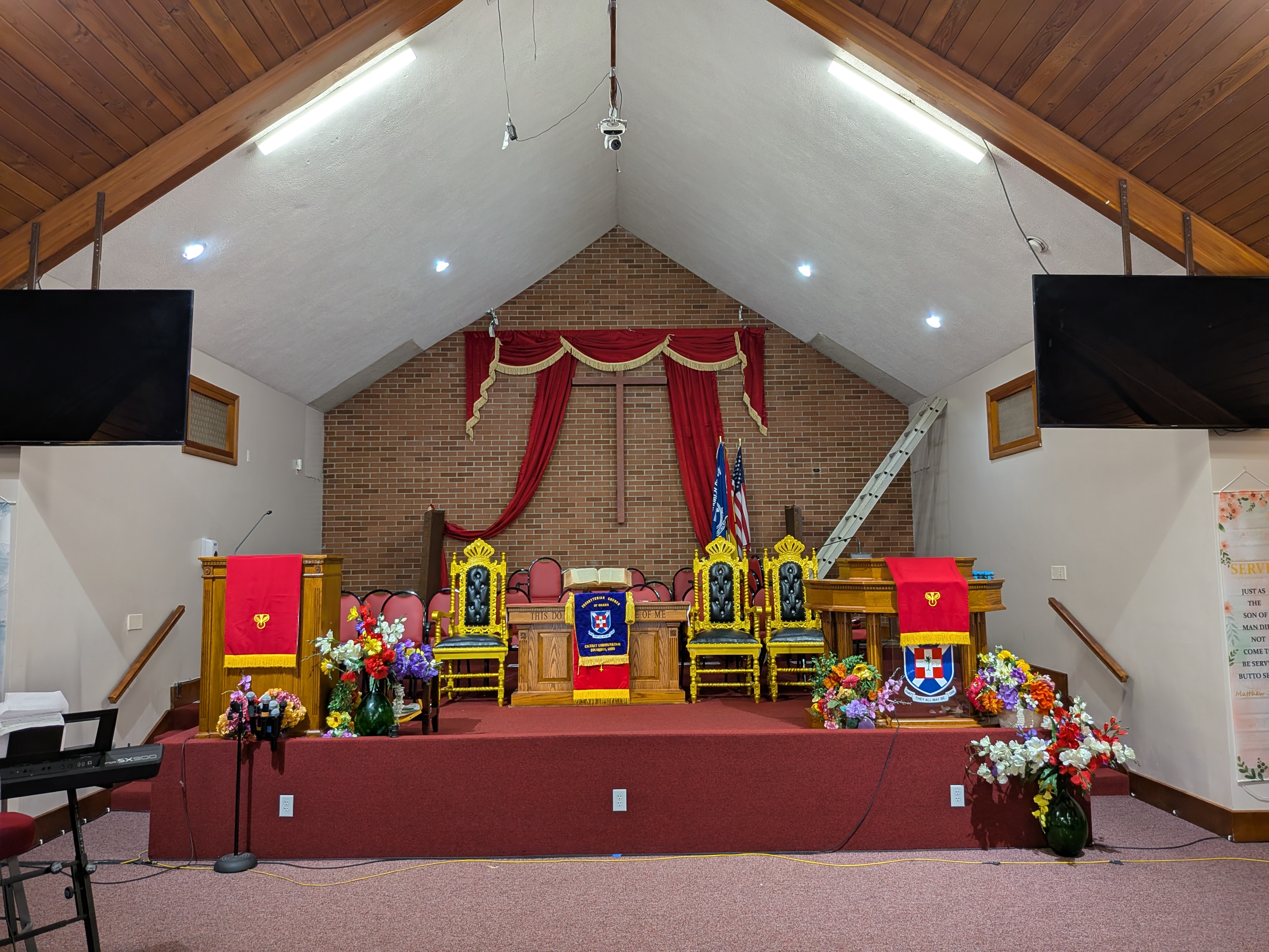Before — Side-mounted TVs at Calvary Presbyterian