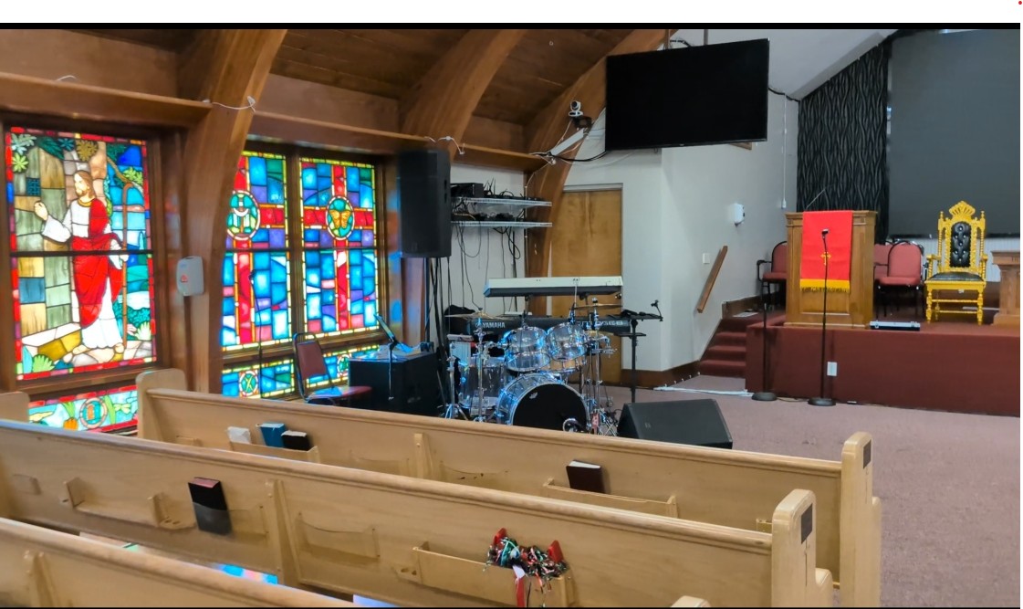 Before — open drum kit with no isolation, bleeding into stage microphones